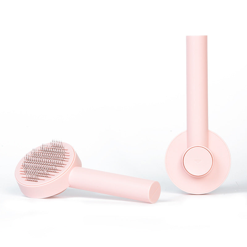 Self-cleaning pet brush for removing loose dog and cat fur during home grooming - Pink